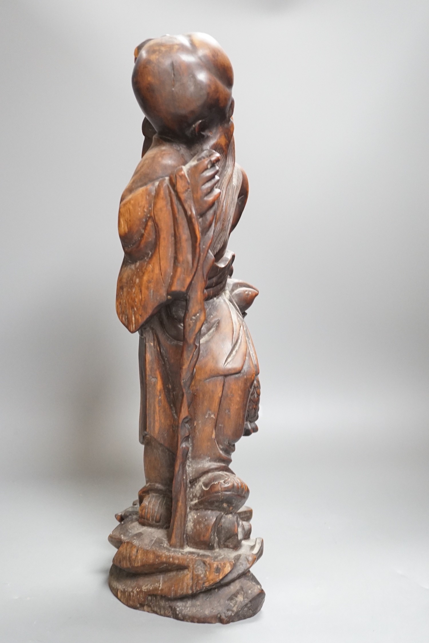 A large early 20th century Chinese hongmu Shou Lao group, 46.5cms high